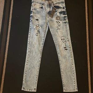 Modern culture blue jeans with checkered holes skinny fit size 30/32.
